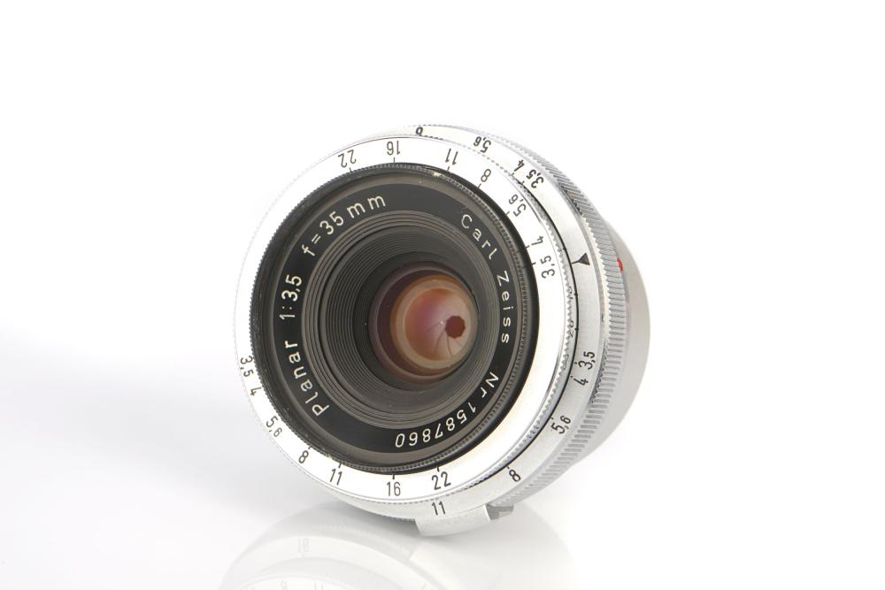 Sold Price A Carl Zeiss Planar f/3.5 35mm Lens. May 4