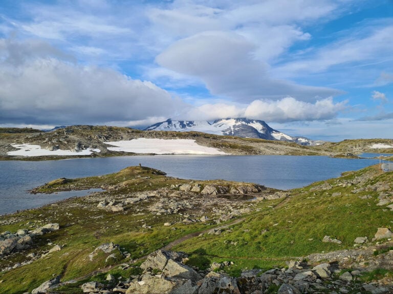 Mountain lakes and distant glaciers are a common sight on the scenic Sognefjellet Route.