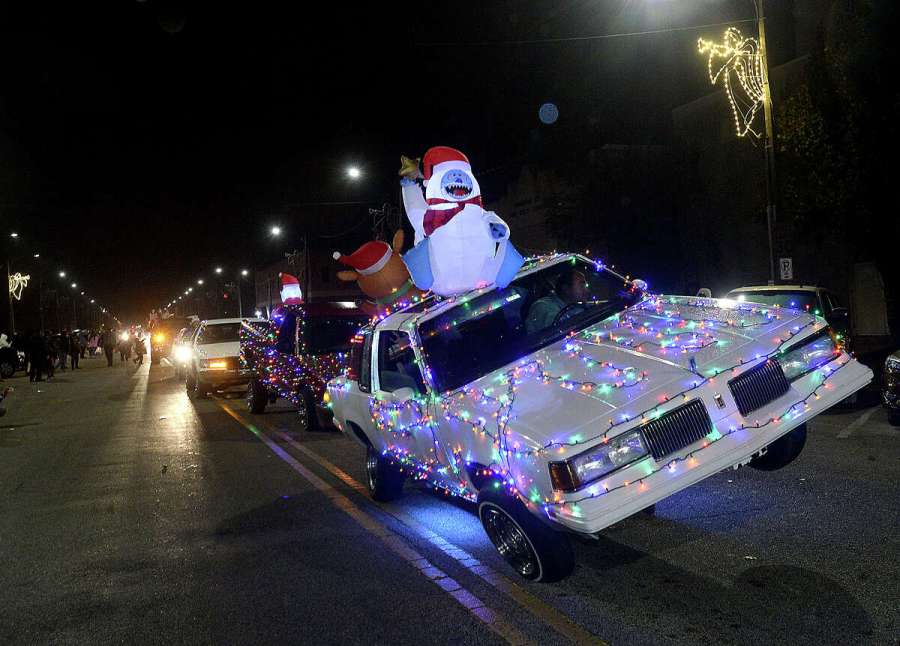 Festive parade participants make their way down Procter Street during the annual Lighted Holiday Parade in Port Arthur on Saturday night. Photo taken on Saturday 8 December 2022 Kim Brent / Enterprise