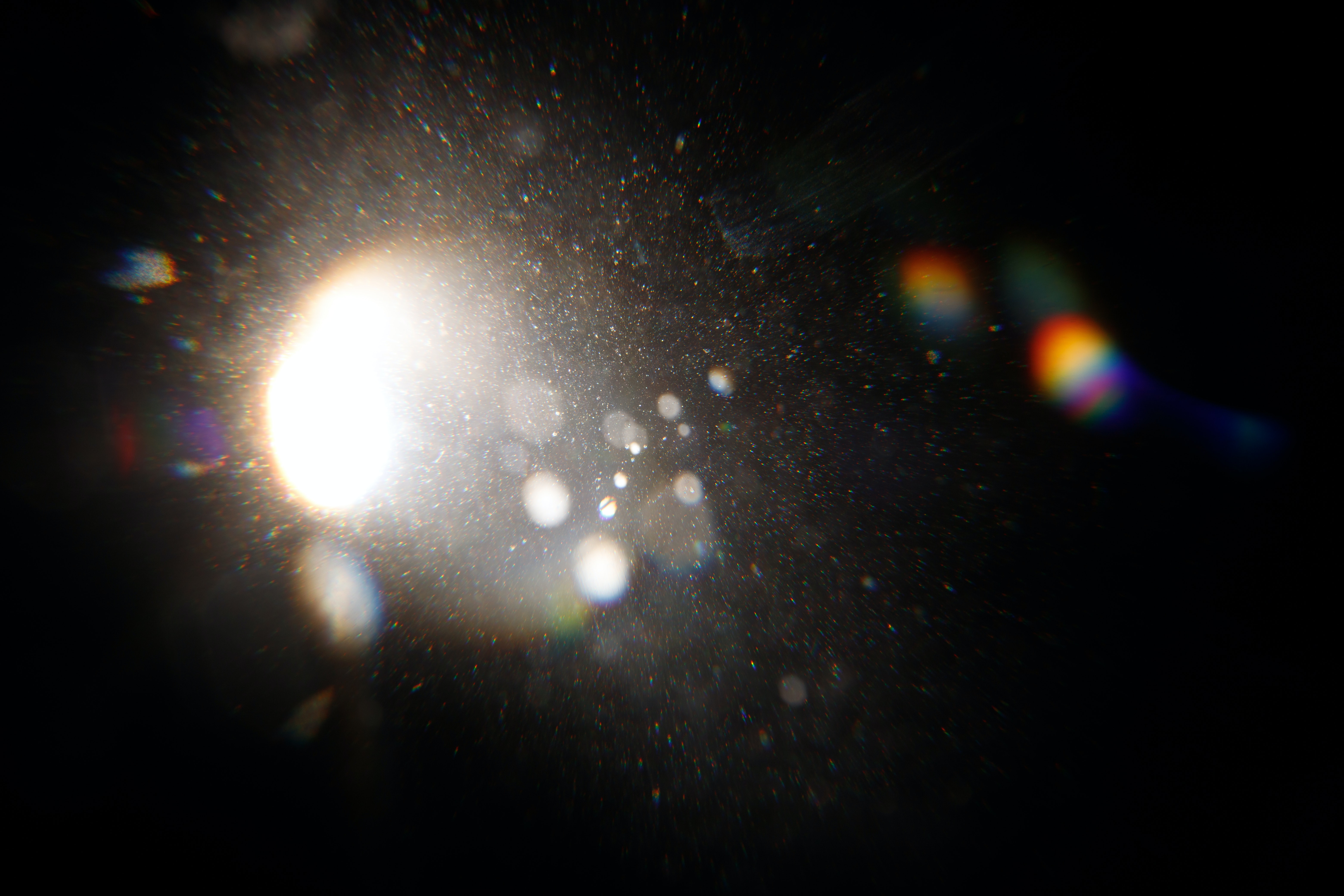 Photo 1451892986 Lens Flare. Light over black