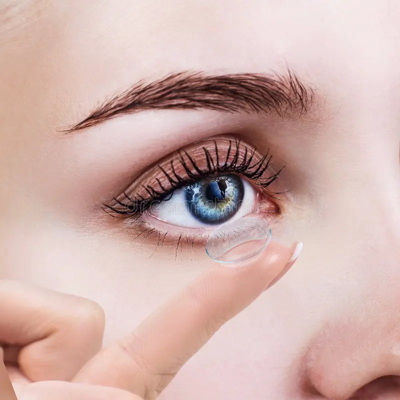 Blue eye contact lens stock photo. Image of corrective