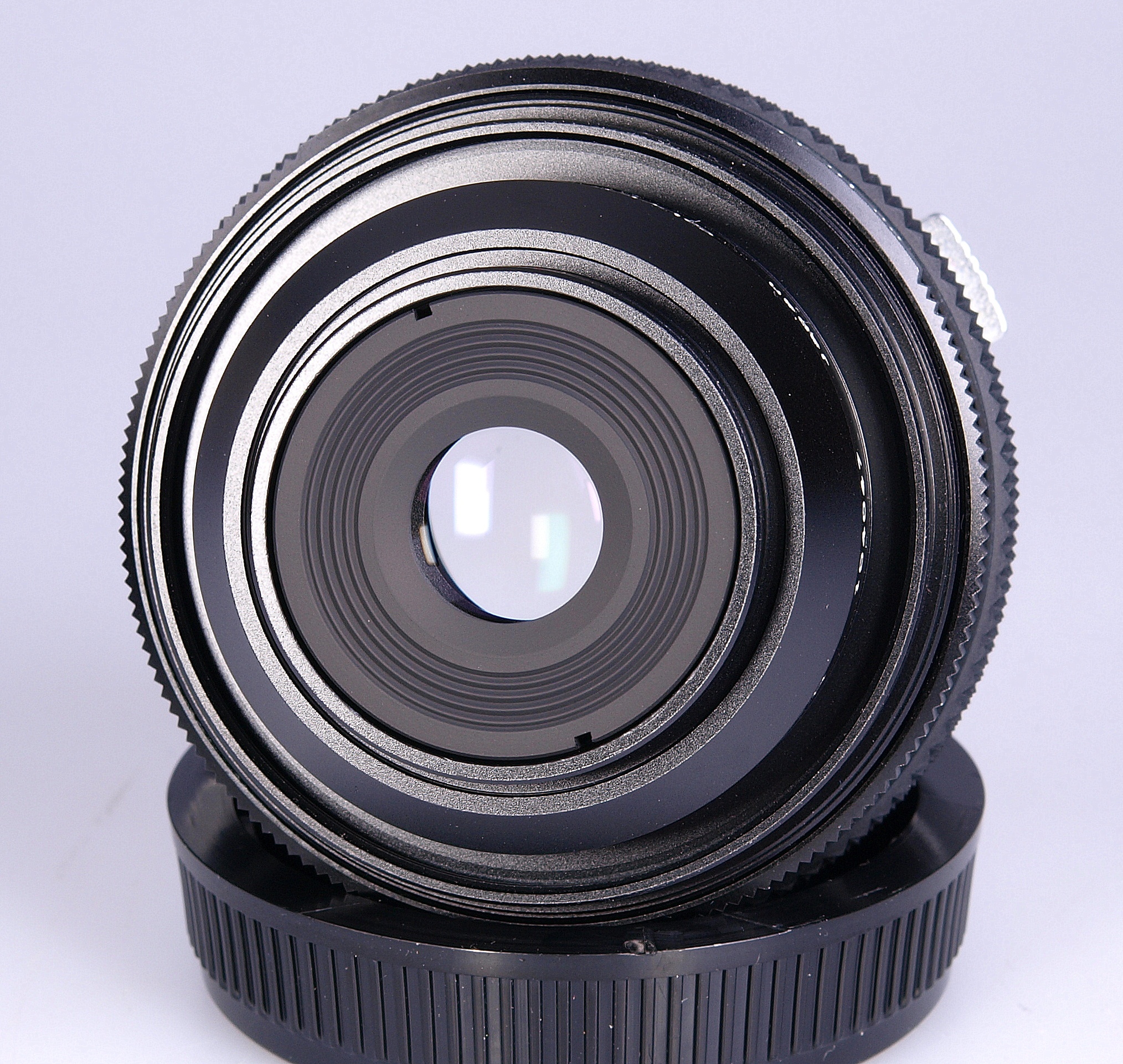 Olympus OMsystem Zuiko auto macro 38mm F2 lens in makers